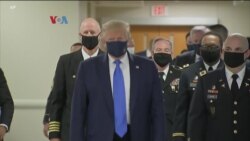 Trump Memakai Masker di Publik di Tengah Lonjakan Kasus COVID-19