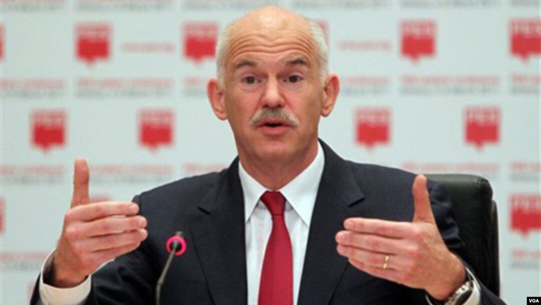 PM Yunani George Papandreou sedikit lega atas penilaian positif UE dan IMF.