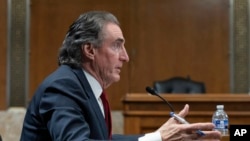 Former North Dakota Governor Doug Burgum, U.S. President Donald Trump's choice for interior secretary, testifies before the Senate Energy and Natural Resources Committee at the Capitol in Washington on Jan. 16, 2025.