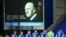 Players observe a minute silence in honor of Britain's Prince Philip, Duke of Edinburgh, on the eve of his funeral, ahead of the English Premier League football match between Everton and Tottenham Hotspur at Goodison Park in Liverpool, April 16, 2021.