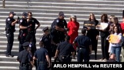 Jane Fonda being arrested during a climate change protest in Washington, Oct. 11, 2019.