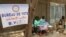 FILE — Electoral workers sit beside a ballot box at a polling station during the presidential election in N’djamena, Chad May 6, 2024.