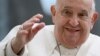 Pope Francis waves during the weekly general audience at St Peter's Square in The Vatican on November 20, 2024. (Photo by Filippo MONTEFORTE / AFP)