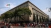 FILE - People walk past Mexico's supreme court in Mexico City on Nov. 24, 2024. 