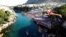 A man jumps from the Old Bridge during 450th traditional diving competition in Mostar, Bosnia and Herzegovina.