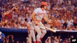 FILE - Pete Rose of the Cincinnati Reds in action at the bat against the Atlanta Braves in Atlanta, Aug. 2, 1978. At left is Atlanta catcher Joe Nolan. 