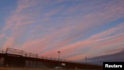 A general view shows the border wall between the United States and Mexico during sunset, as seen from Ciudad Juarez, Mexico, on Feb. 26, 2025. The U.S. will deploy almost 3,000 more troops to the border, military officials said on March 1, 2025.