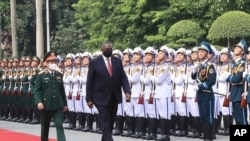 US Secretary of Defense Lloyd Austin, with Vietnamese Defense Minister Phan Van Giang, left, inspects an honor guard in Hanoi, Vietnam, July 29, 2021.