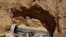 FILE - Part of a tunnel exposed by the Israeli military is seen on the Israeli side of the Israel-Gaza border, Aug. 14, 2014
