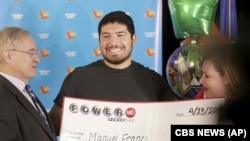 FILE - Manuel Franco, of Wisconsin, won the $768.4 million Powerball lottery jackpot, April 23, 2019. (John Hart/Wisconsin State Journal/AP)