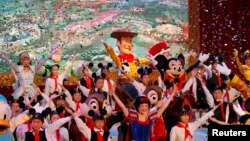 Dancers perform during the groundbreaking ceremony of Shanghai Disneyland in Pudong, China, April 8, 2011.