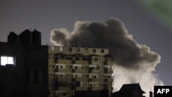FILE - Smoke rises over buildings amid Israeli bombardment in Rafah in the southern Gaza Strip on February 3, 2024, as fighting continues between Israel and the Palestinian Hamas group.