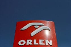 FILE PHOTO: The logo of PKN Orlen, Poland's top oil refiner, is pictured at a petrol station in Warsaw, Poland, April 25, 2019.