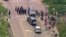 Policija na mestu pucnjave u Hajlend parku u pregrađu Čikaga (Foto:ABC affiliate WLS/ABC7 via REUTERS) 
