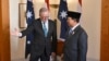 Indonesia's President-elect Prabowo Subianto, right, is greeted by Australian Prime Minister Anthony Albanese at Parliament House in Canberra, Australia, Aug. 20, 2024. 