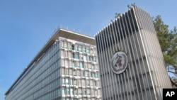 This March 11, 2015 photo shows the World Health Organization (WHO) headquarters building in Geneva, Switzerland.