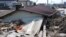 The 2011 quake and resulting tsunami waves killed an estimated 18,000 people and triggered the meltdowns of three nuclear reactors in Fukushima, Japan. (S. Herman/VOA)