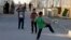 Syrian refugee children play with a soccer ball at the Mrajeeb Al Fhood refugee camp in Zarqa, Jordan, July 1, 2014.