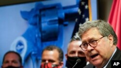 Attorney General William Barr talks to the media during a news conference about Operation Legend, a federal task force formed to fight violent crime in several U.S. cities, in Kansas City, Missouri, Aug. 19, 2020.