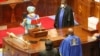 The Speaker of the National Assembly, Job Ndugai, swears in Stergomena Tax as a member of Tanzania's parliament, Sept. 10, 2021. Tax was subsequently appointed defense minister. (Twitter @Hakingowi) 