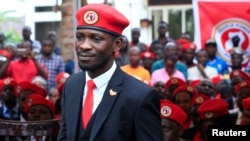 Ugandan musician turned politician, Robert Kyagulanyi also known as Bobi Wine arrives at the news conference at his home in Kasangati, Kampala, Uganda, July 24, 2019.