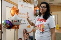 FILE - In this Dec. 10, 2019 photo, Maria Jose Chapa gestures during an interview after officially opening the first Hispanic Federation field office in Davenport, Fla.