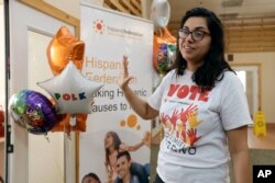 FILE - In this Dec. 10, 2019 photo, Maria Jose Chapa gestures during an interview after officially opening the first Hispanic Federation field office in Davenport, Fla.