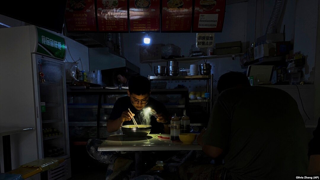 APTOPIX China Power Outages