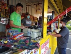 Sales of fireworks are booming amid the coronavirus pandemic, including at this fireworks stand in Fairfax County, Virginia, June 30, 2020. (Deborah Block/VOA)