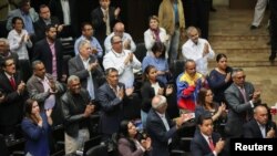 Pro-government lawmakers attend a session of Venezuela's National Assembly in Caracas, Sept. 24, 2019.