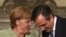 Nemačka kancelarka Angela Merkel i grčki premijer Antonis Samaras prilikom ranijeg susreta u Atini (arhivski snimak)