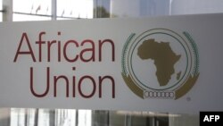 FILE - The logo of the African Union (AU) is seen at the entrance of AU headquarters in Addis Ababa, Ethiopia, March 13, 2019. 