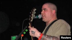 Wade Michael Page, 40, is seen in this undated picture from a myspace.com web page for the musical group 'End Apathy.' Racist skinhead music is in the spotlight after the recent shootings at a Sikh temple.