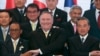 US Secretary of State Mike Pompeo crosses his arms for the traditional 'ASEAN handshake' with Chinese FM Wang Yi and fellow diplomats, during the 26th ASEAN Regional Forum (ARF), Bangkok, Thailand, Aug. 2, 2019.