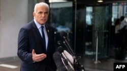 Israel'’s opposition leader and former prime minister Yair Lapid delivers a statement to the press following his meeting with U.S. Secretary of State Antony Blinken at the State Department in Washington, Sept. 16, 2024.