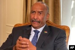 FILE - Sudan's General Abdel-Fattah Burhan answers questions during an interview, on Sept. 22, 2022, in New York.
