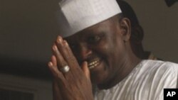 Maj. Hamza Al-Mustapha leaves the court after a verdict in Lagos, Nigeria, on Monday, Jan. 30, 2012.