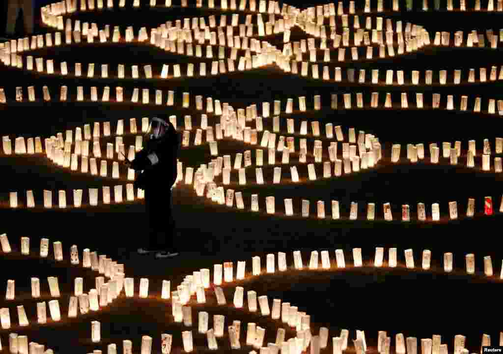 Paper lanterns are lit for the victims of the March 11, 2011, earthquake and tsunami disaster that killed thousands and triggered the worst nuclear accident since Chernobyl, in Tokyo, Japan.