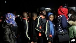 FILE - Hundreds of Nigerians arrived in Lagos, having been repatriated from Libya by the African Union (AU) amid outrage over recent footage that showed migrants being auctioned off as slaves, Dec. 2017. 