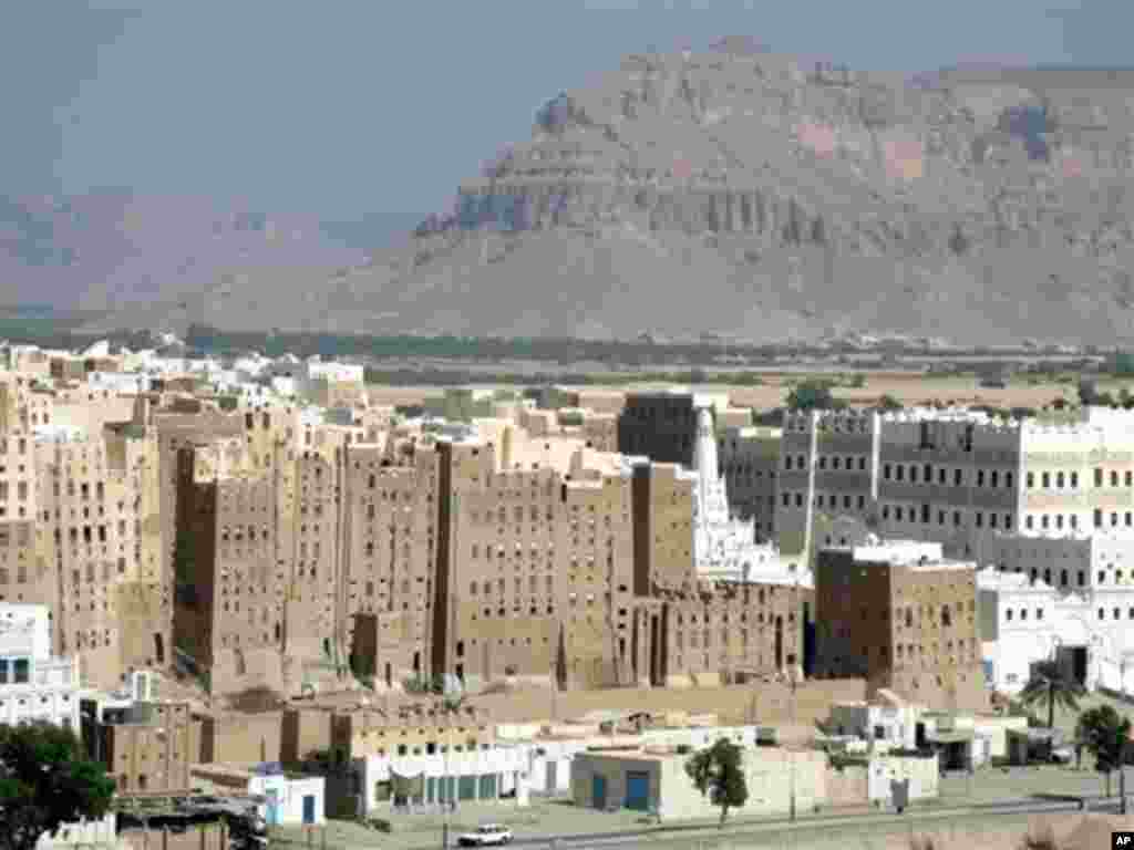 ** FILE ** the historical skyscrapers city of Shibam in Hadramut , Yemen, is seen in this Dec.7, 2007 file photo . Gunmen believed to be al-Qaida militants opened fire Friday, Jan. 18, 2008 on a tourist convoy in eastern Yemen, killing two Belgian women