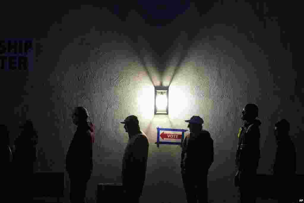 Voters stand in line outside a polling place at Madison Church, Nov. 5, 2024, in Phoenix, Arizona.