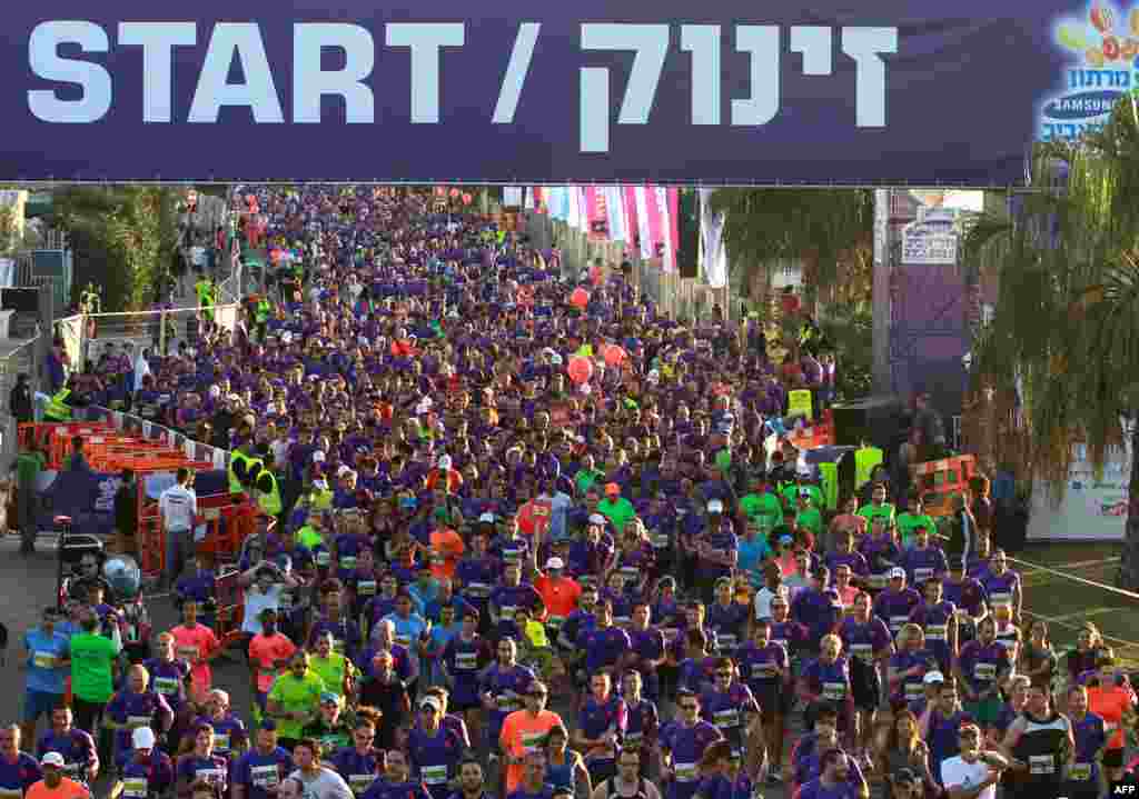 Runners participate in the 2015 Tel Aviv Marathon in the Mediterranean coastal city of Tel Aviv.