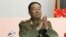 FILE - Recently executed then-Vice Marshal Hyon Yong Chol applauds during a meeting at the April 25 House of Culture announcing North Korean leader Kim Jong Un's new title of marshal.