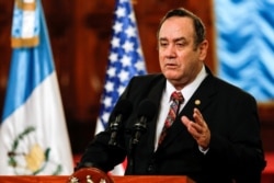 FILE - Guatemala's president, Alejandro Giammattei, speaks during a news conference in Guatemala City, Feb. 7, 2020.