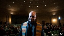 FILE - Rev. Charles Lattimore takes the stage during a public commemoration service for 19 unidentified Black Philadelphians whose remains were part of a display at the University of Pennsylvania's Penn Museum on February 3, 2024, in Philadelphia.