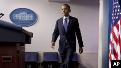 President Barack Obama approaches podium to discuss about the economy, White House, June 8, 2012.