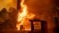 The Carr Fire tears through Shasta, Calif., July 26, 2018. Fueled by high temperatures, wind and low humidity, the blaze destroyed multiple homes and at least one historic building.