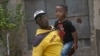 Juan Yainier Antomarchi Nunez holds his son Angelo in Havana, Cuba, Jan. 16, 2025, after being conditionally released from detention for participating in 2021 anti-government protests.