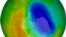 FILE - A false-color view of total ozone over the Antarctic pole is seen in this NASA handout image released Oct. 24, 2012. The purple and blue colors are where there is the least ozone. The average area covered by the Antarctic ozone hole in that year w
