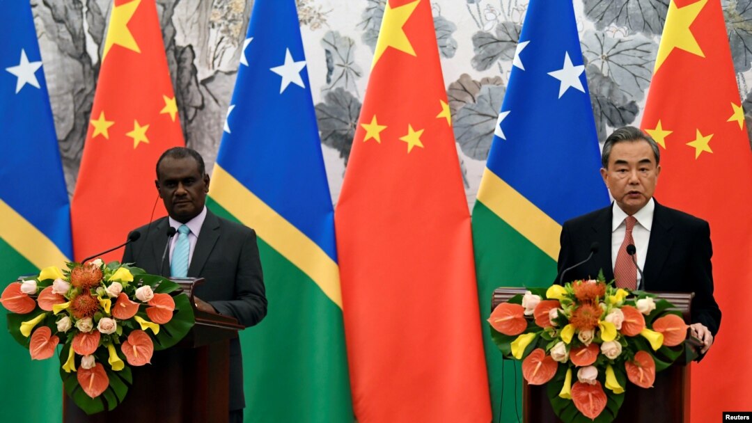 Solomon Islands Foreign Minister Jeremiah Manele and Chinese State Councilor and Foreign Minister Wang Yi hold joint news conference at the Diaoyutai State Guesthouse in Beijing, China, Sept. 21, 2019. 